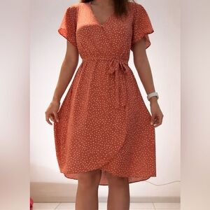 Knee-length Pink dress with white polka dots